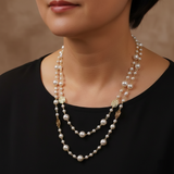 Elegantiškas auksinis kaklo papuošalas su perla