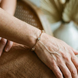 Elegantiška apyrankė su cirkoniais auksu